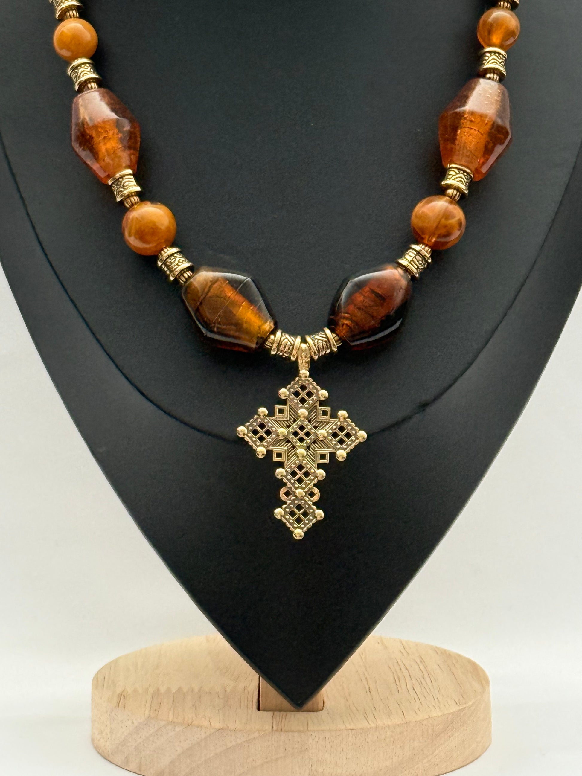Amber Murano Glass Necklace with Brass Cross Pendant
