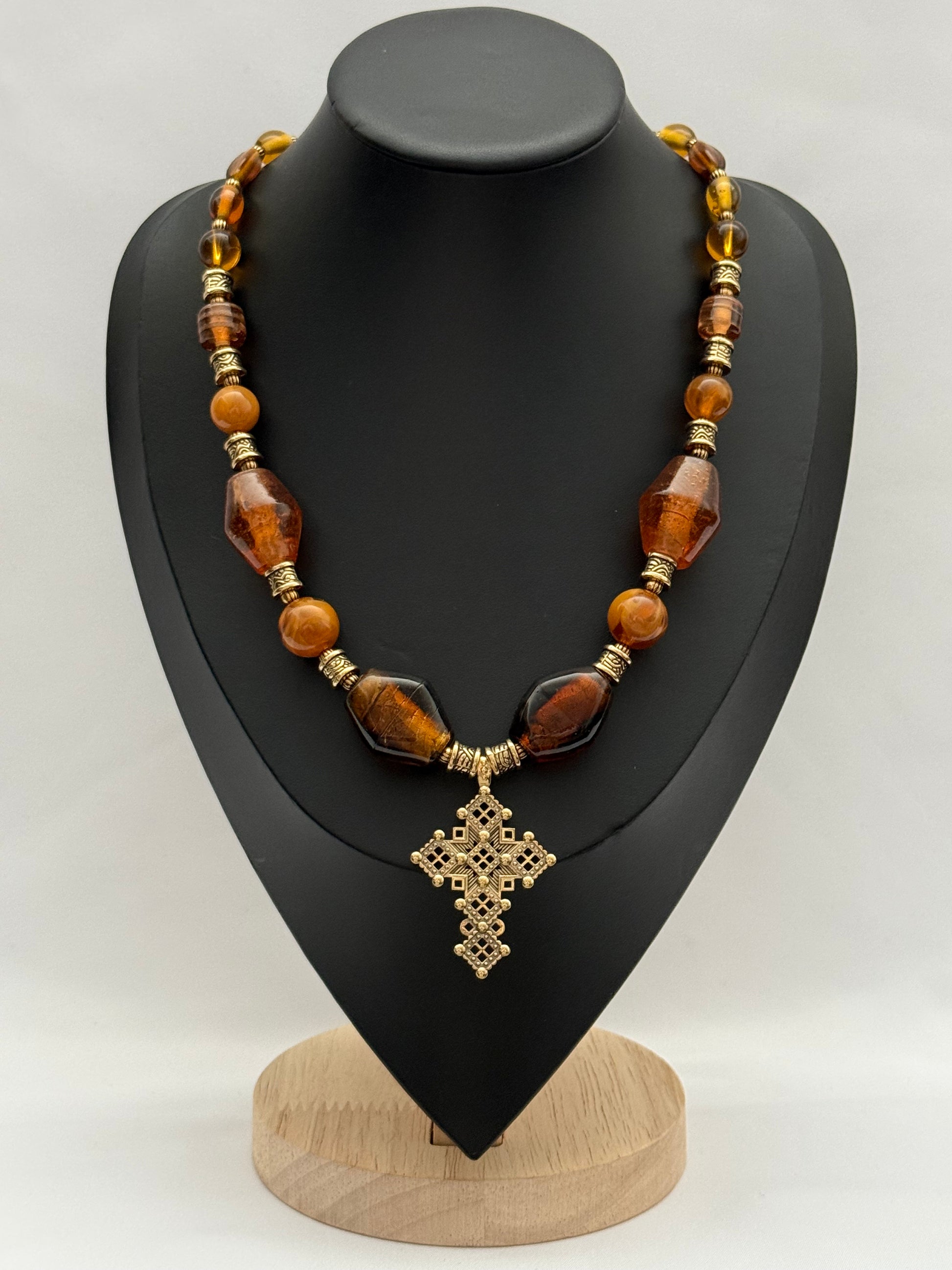 Amber Murano Glass Necklace with Brass Cross Pendant
