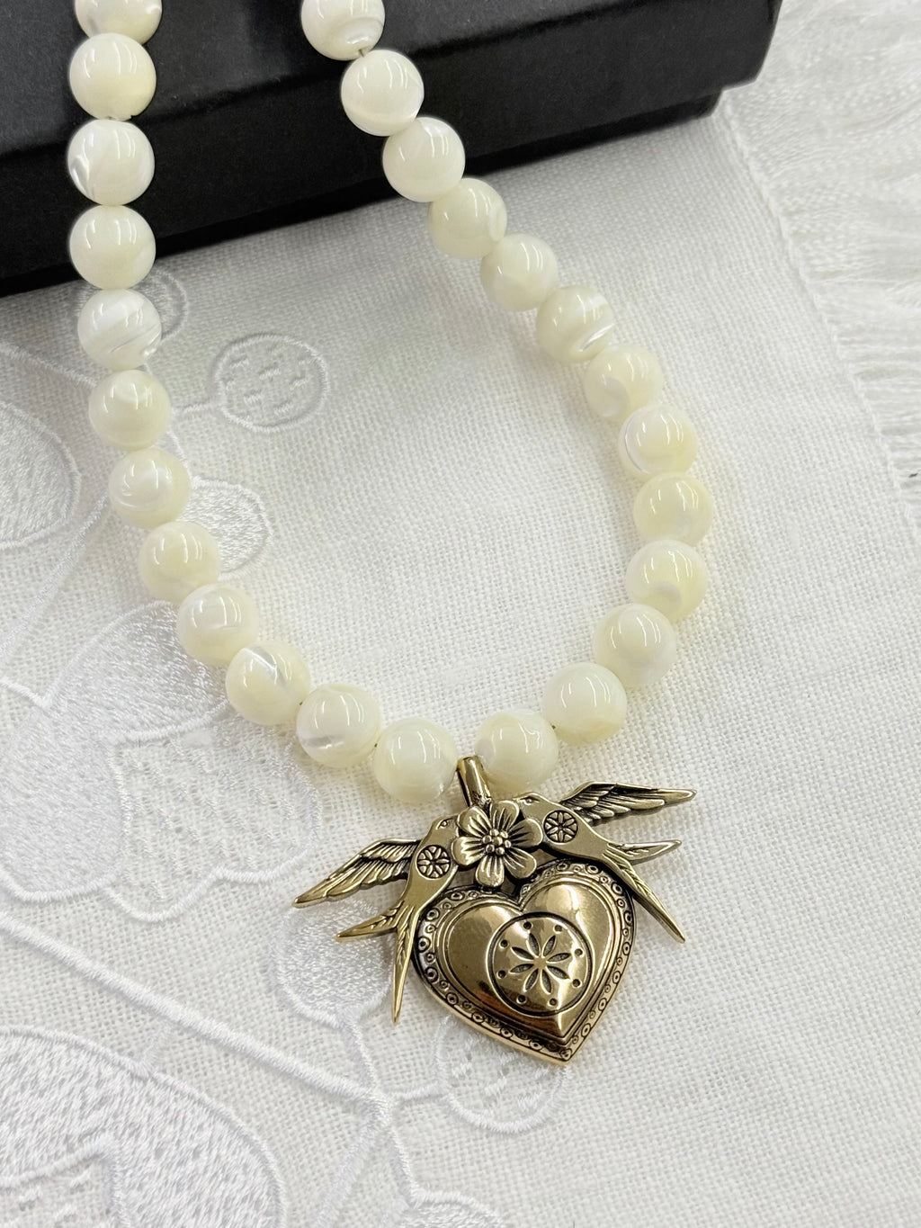 Mother of Pearl Necklace with “Yahnusok” Brass Pendant
