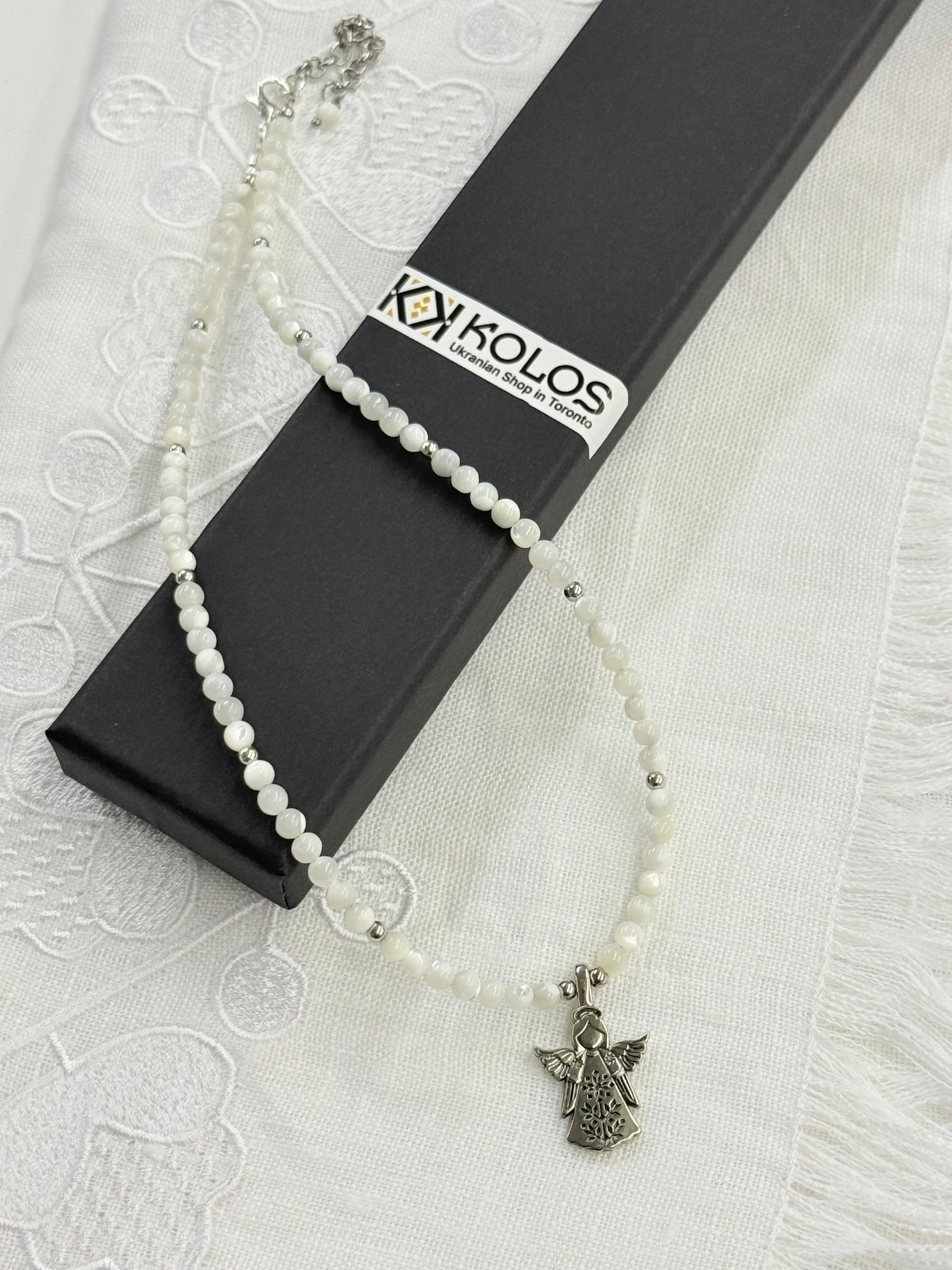 Mother of Pearl Necklace with “Angel” German Silver Pendant
