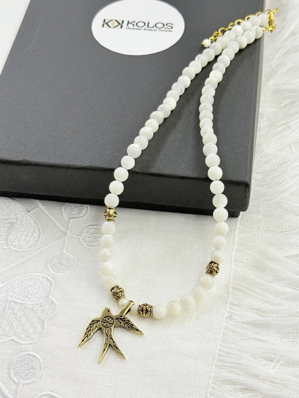 Mother of Pearl Necklace with “Swallow” Brass Pendant