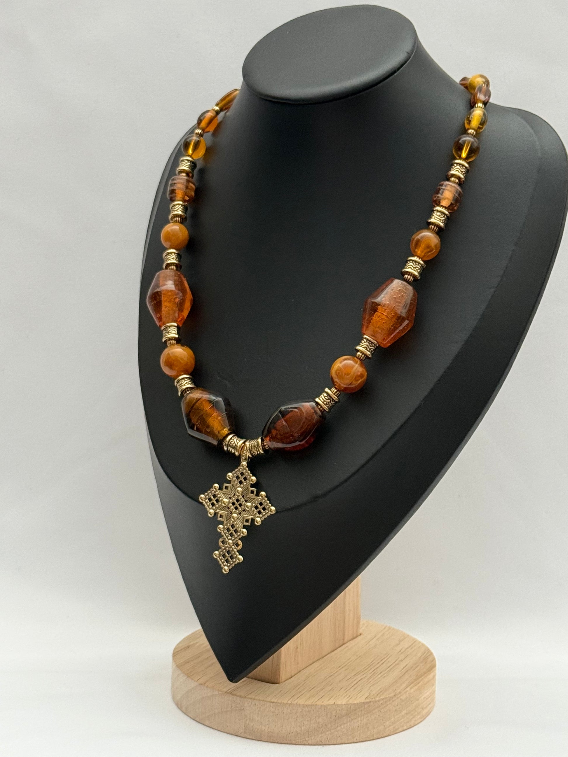 Amber Murano Glass Necklace with Brass Cross Pendant