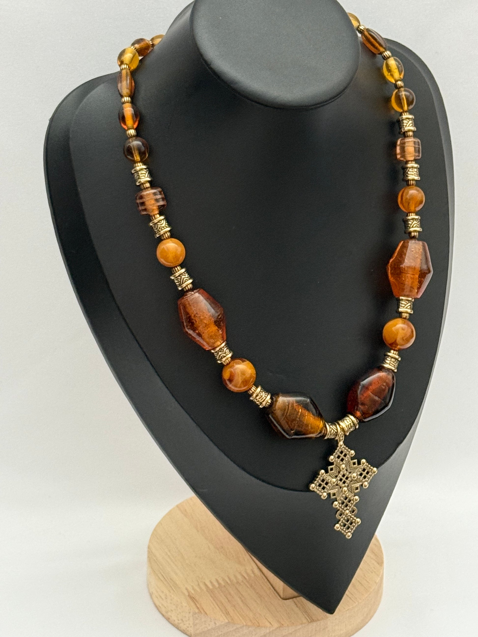 Amber Murano Glass Necklace with Brass Cross Pendant