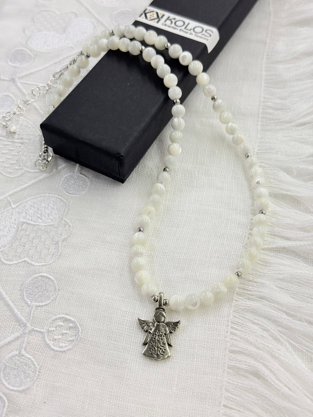 Mother of Pearl Necklace with “Angel” German Silver Pendant