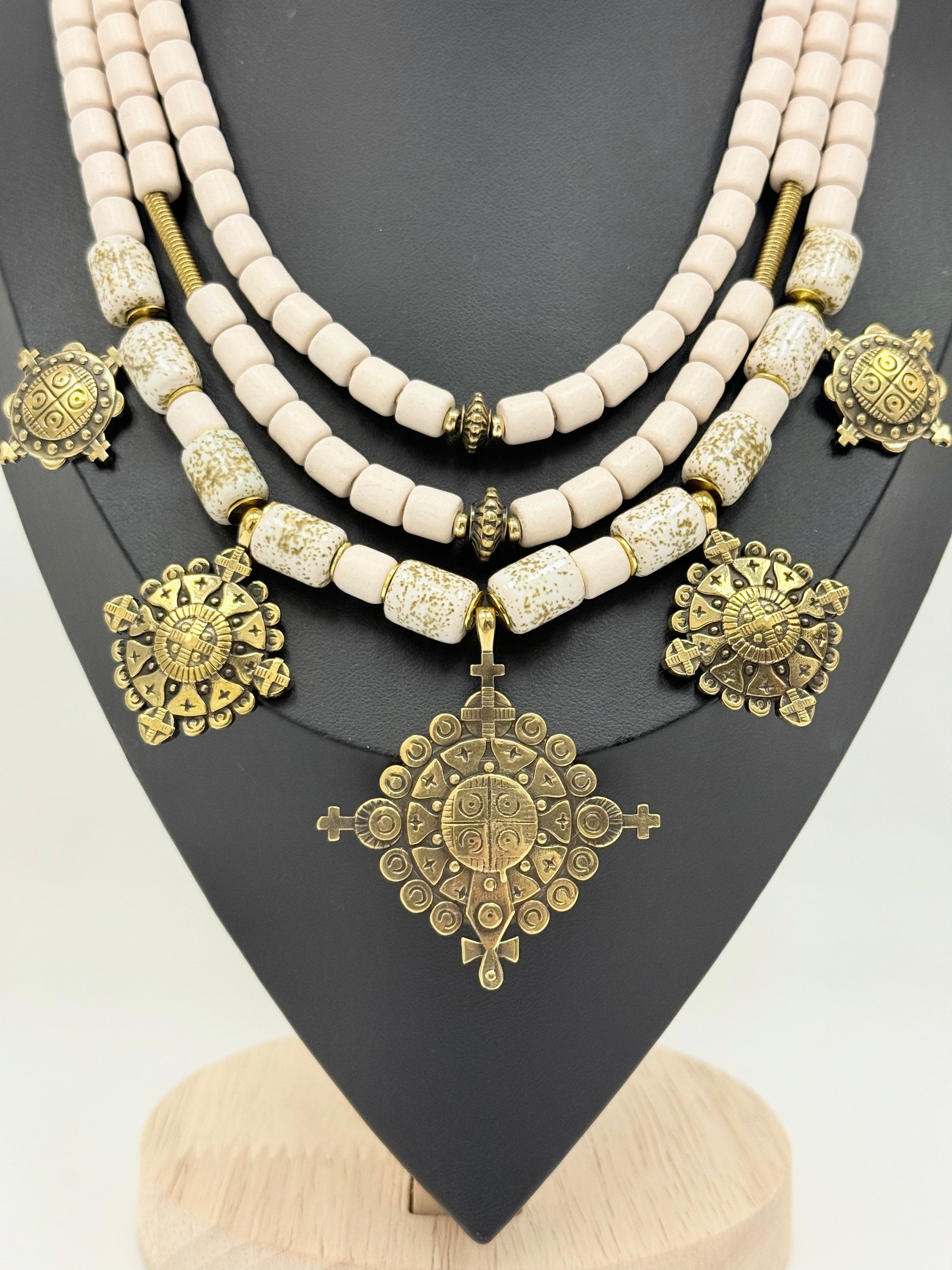 Three-Strand Traditional Ukrainian Necklace with Light Kosiv Ceramic and Brass Zgarda Crosses