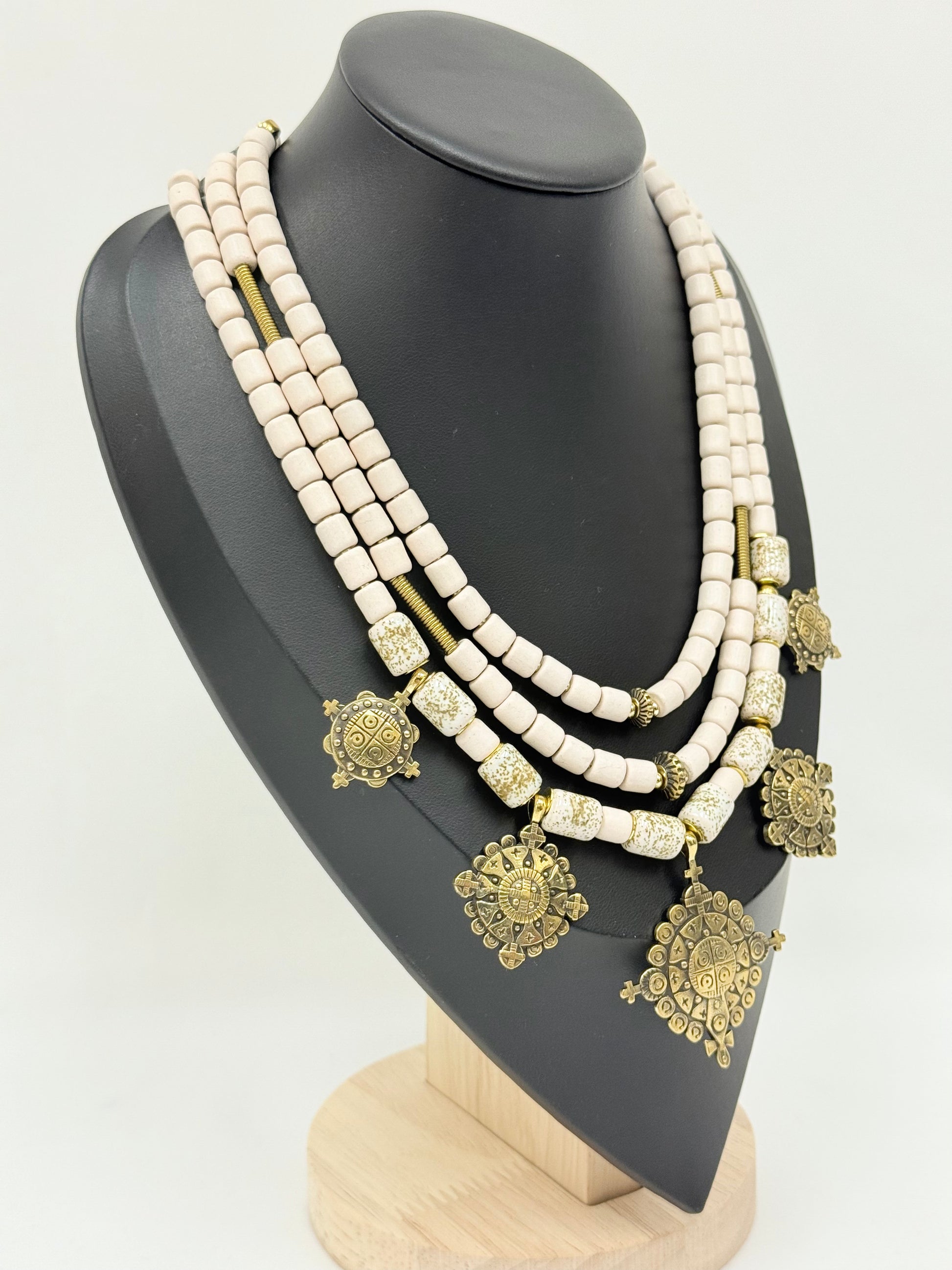 Three-Strand Traditional Ukrainian Necklace with Light Kosiv Ceramic and Brass Zgarda Crosses
