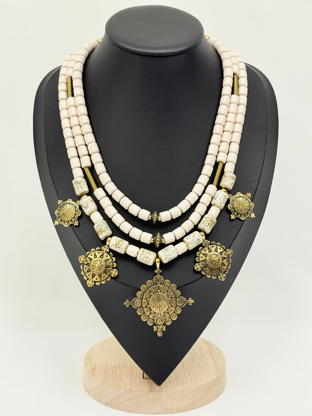 Three-Strand Traditional Ukrainian Necklace with Light Kosiv Ceramic and Brass Zgarda Crosses