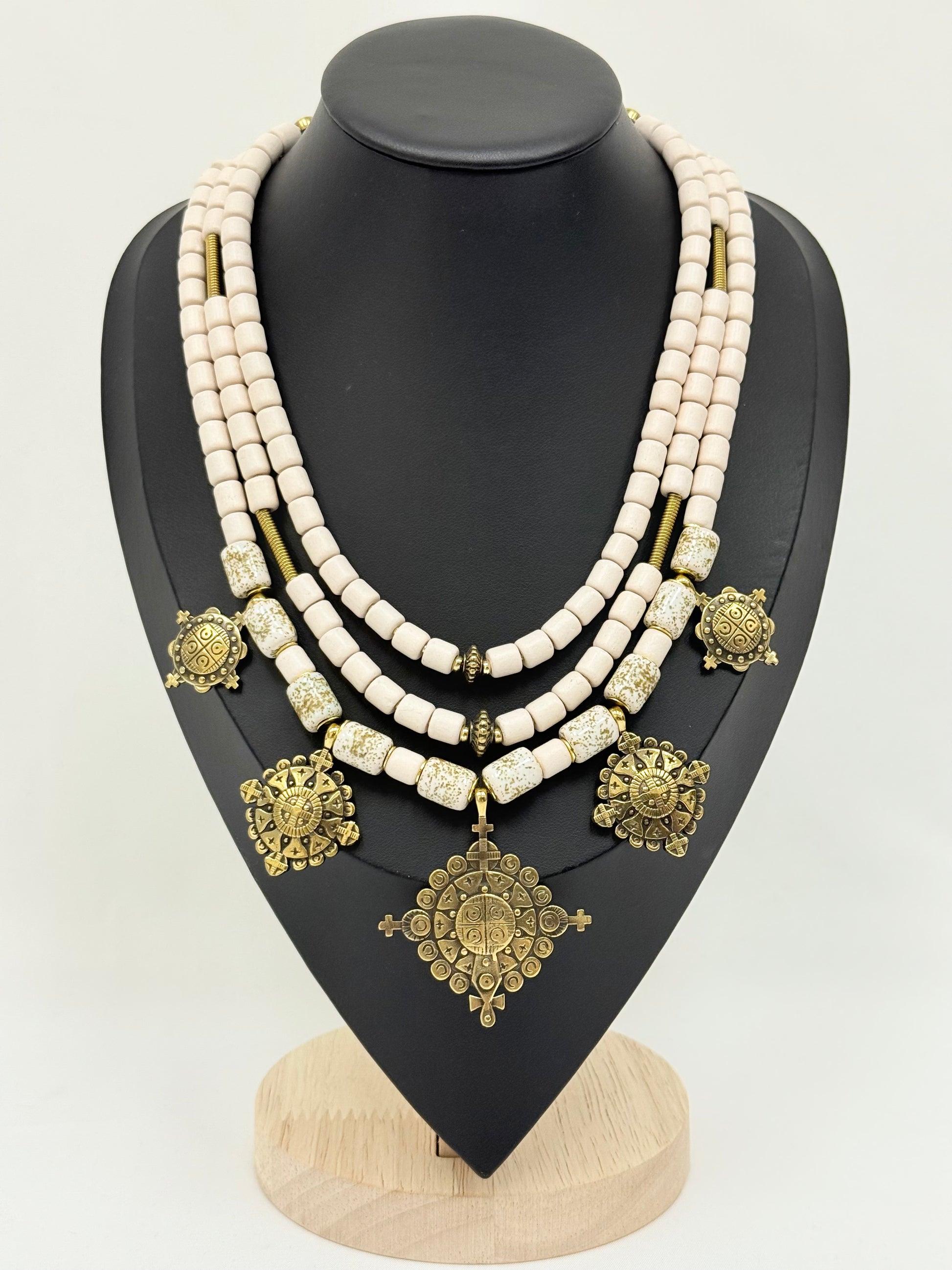 Three-Strand Traditional Ukrainian Necklace with Light Kosiv Ceramic and Brass Zgarda Crosses