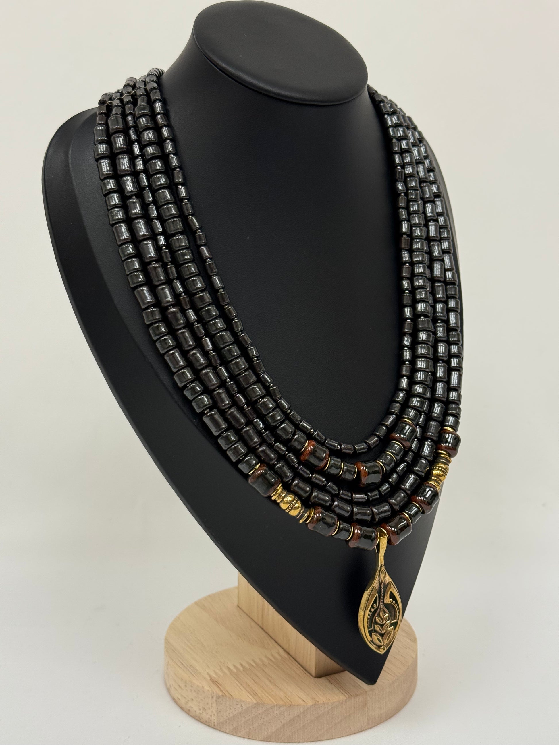 Five-Strand Kosiv Ceramic Necklace with Brass Petal Pendant