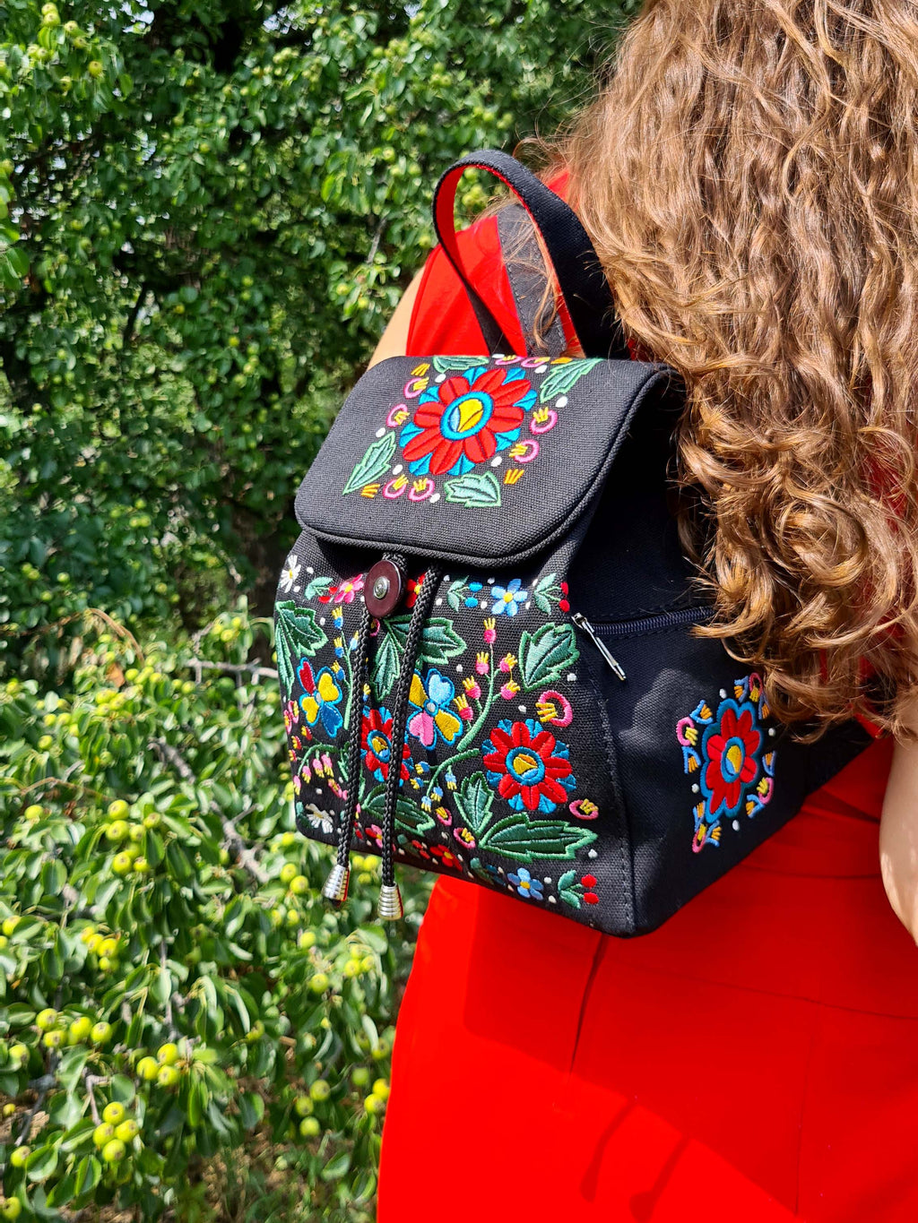 Backpack with "Unconquered" embroidery, black