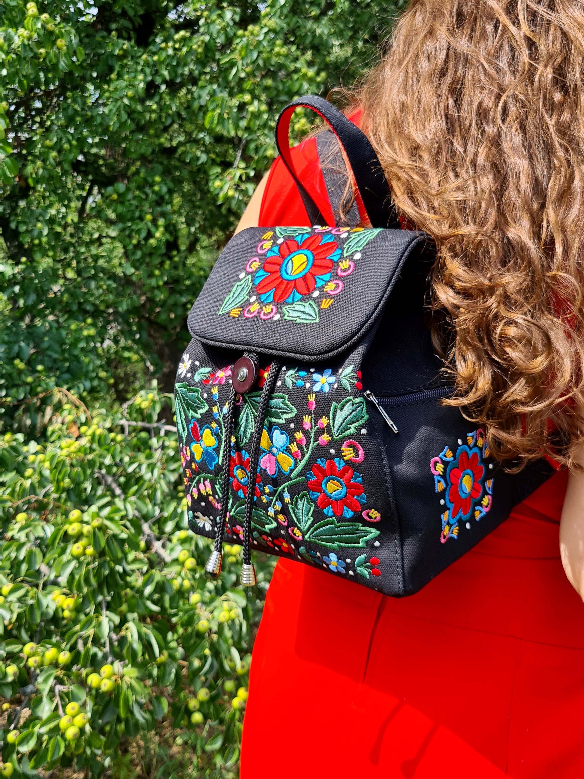 Backpack with "Unconquered" embroidery, black