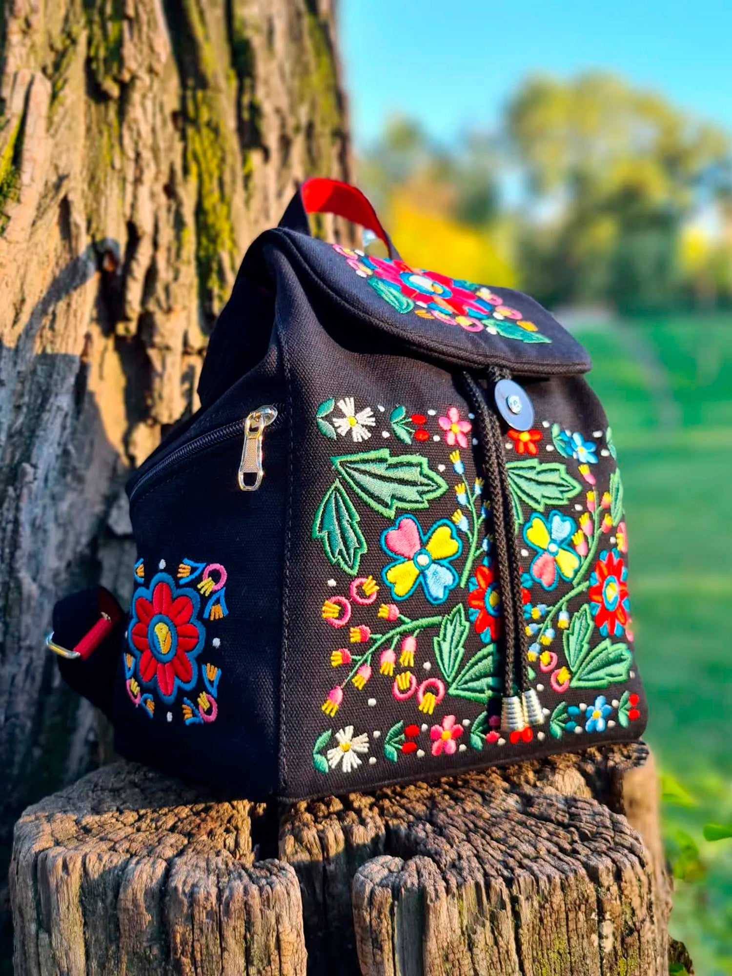 Backpack with "Unconquered" embroidery, black