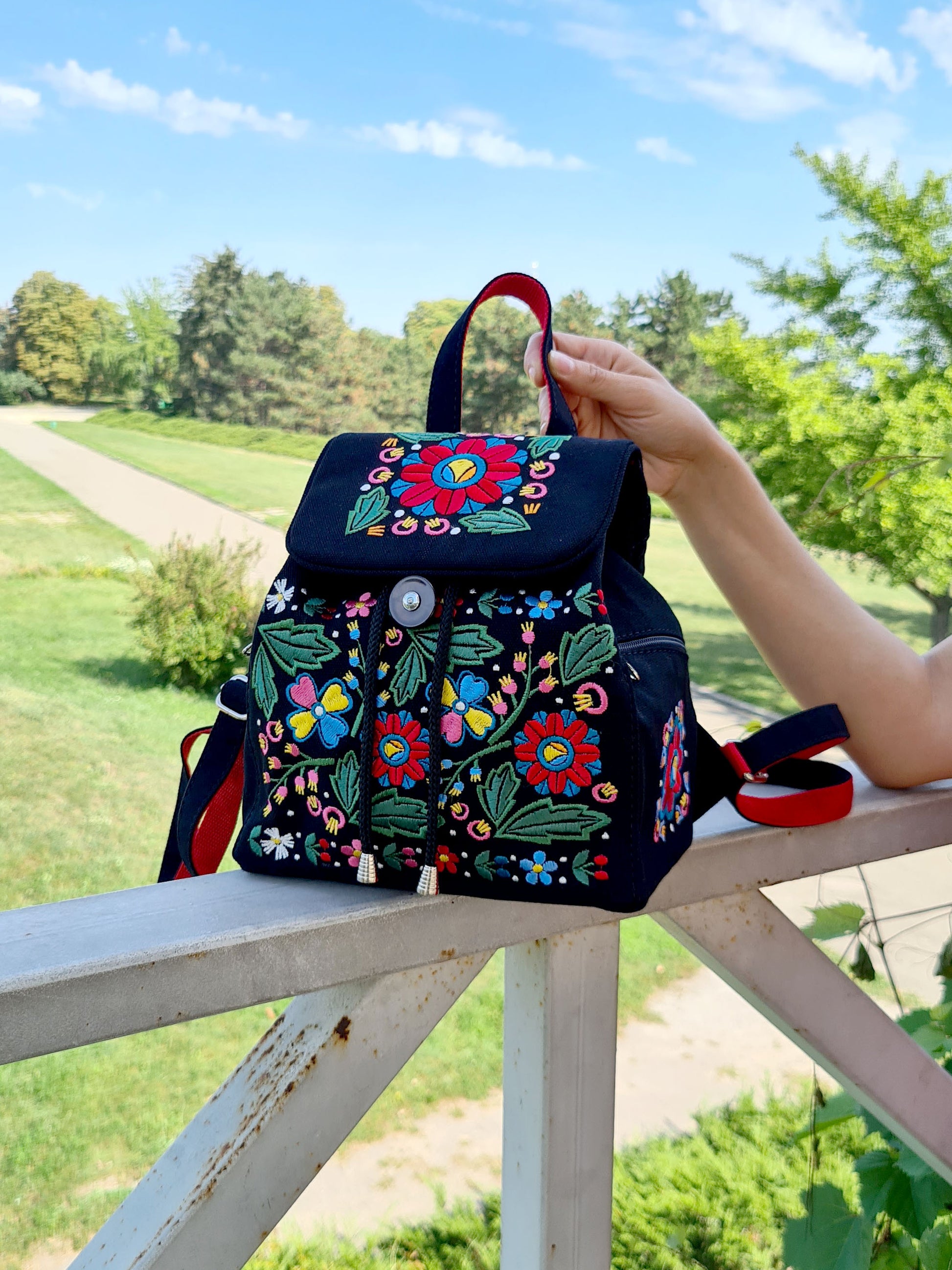 Backpack with "Unconquered" embroidery, black