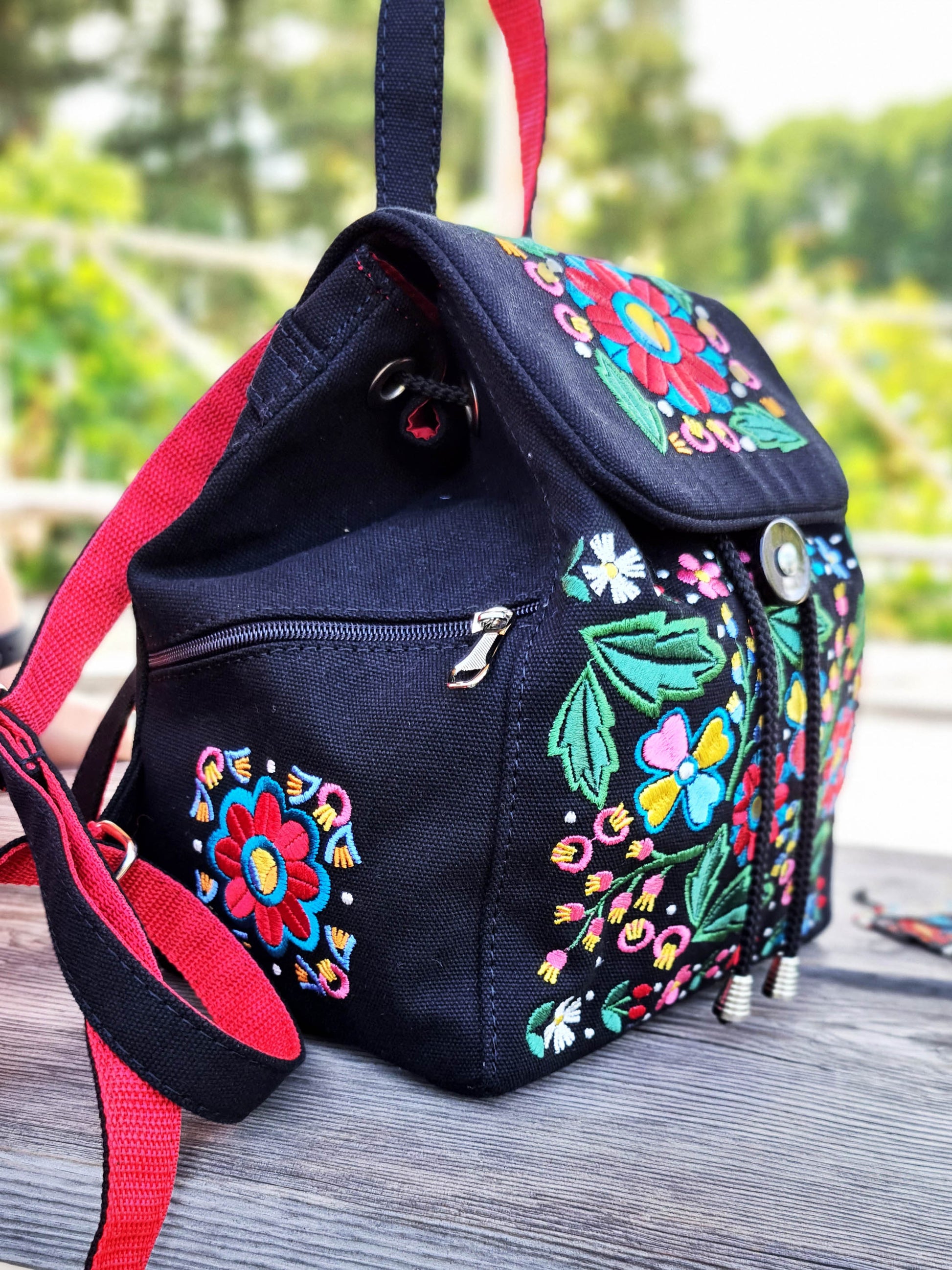 Backpack with "Unconquered" embroidery, black