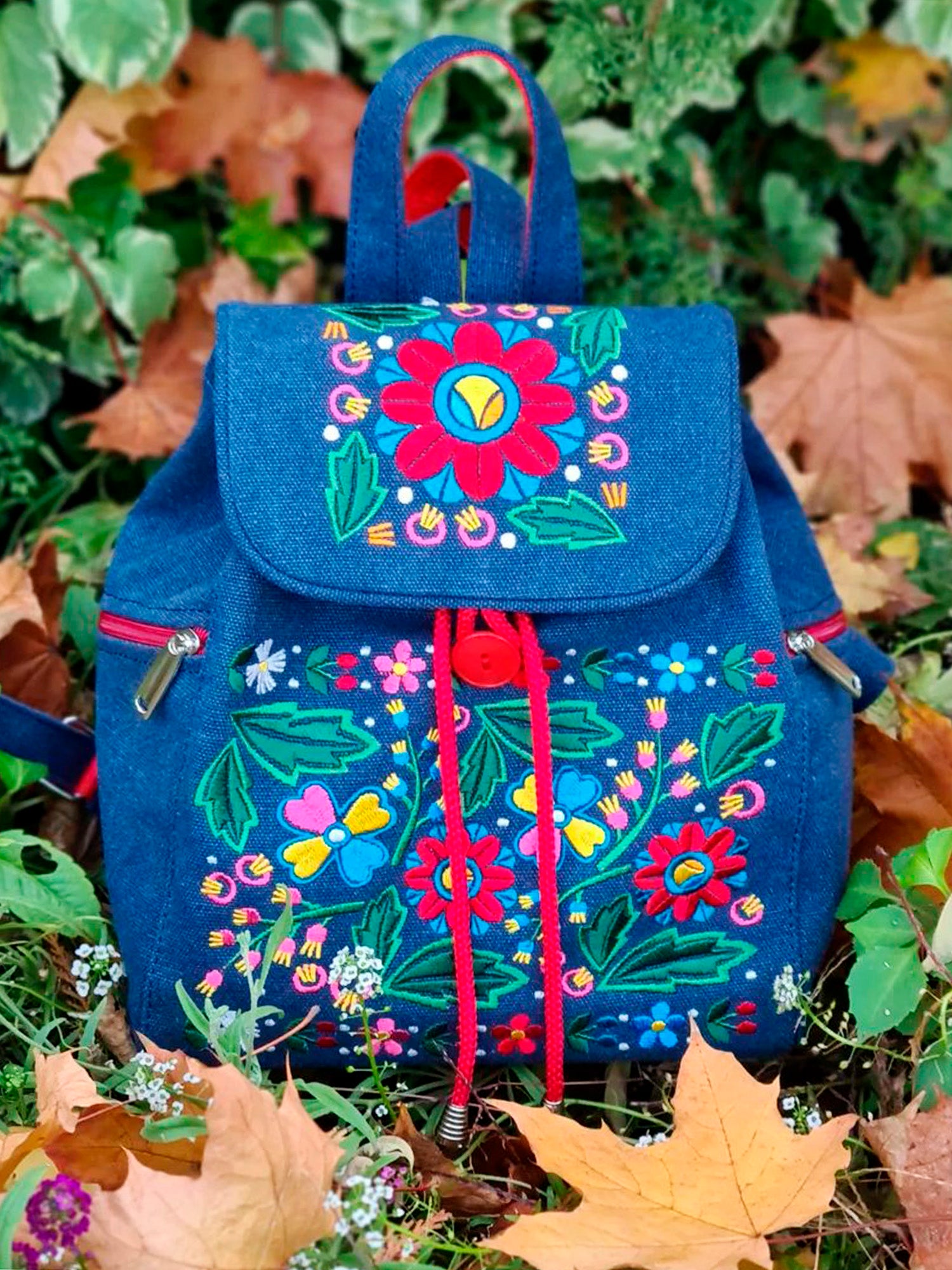 Backpack with "Unconquered" embroidery, blue
