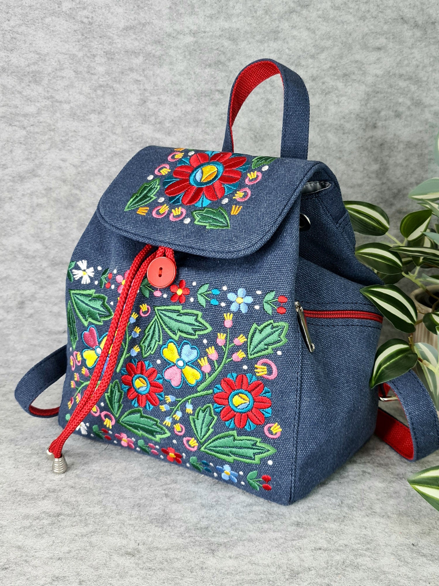 Backpack with "Unconquered" embroidery, blue