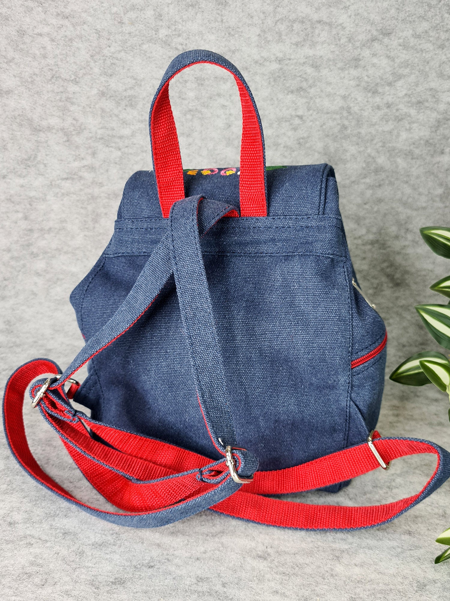 Backpack with "Unconquered" embroidery, blue