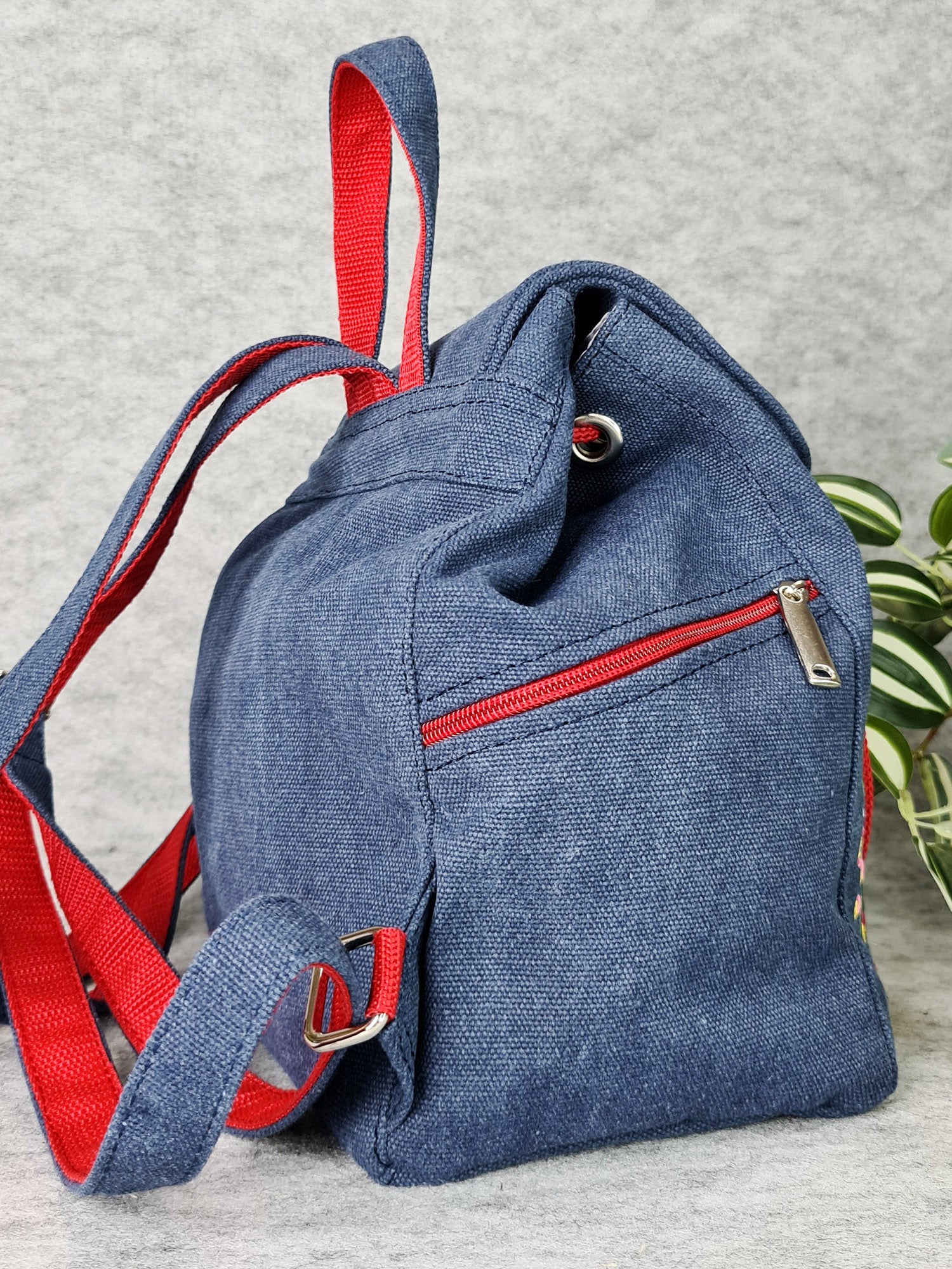 Backpack with "Unconquered" embroidery, blue