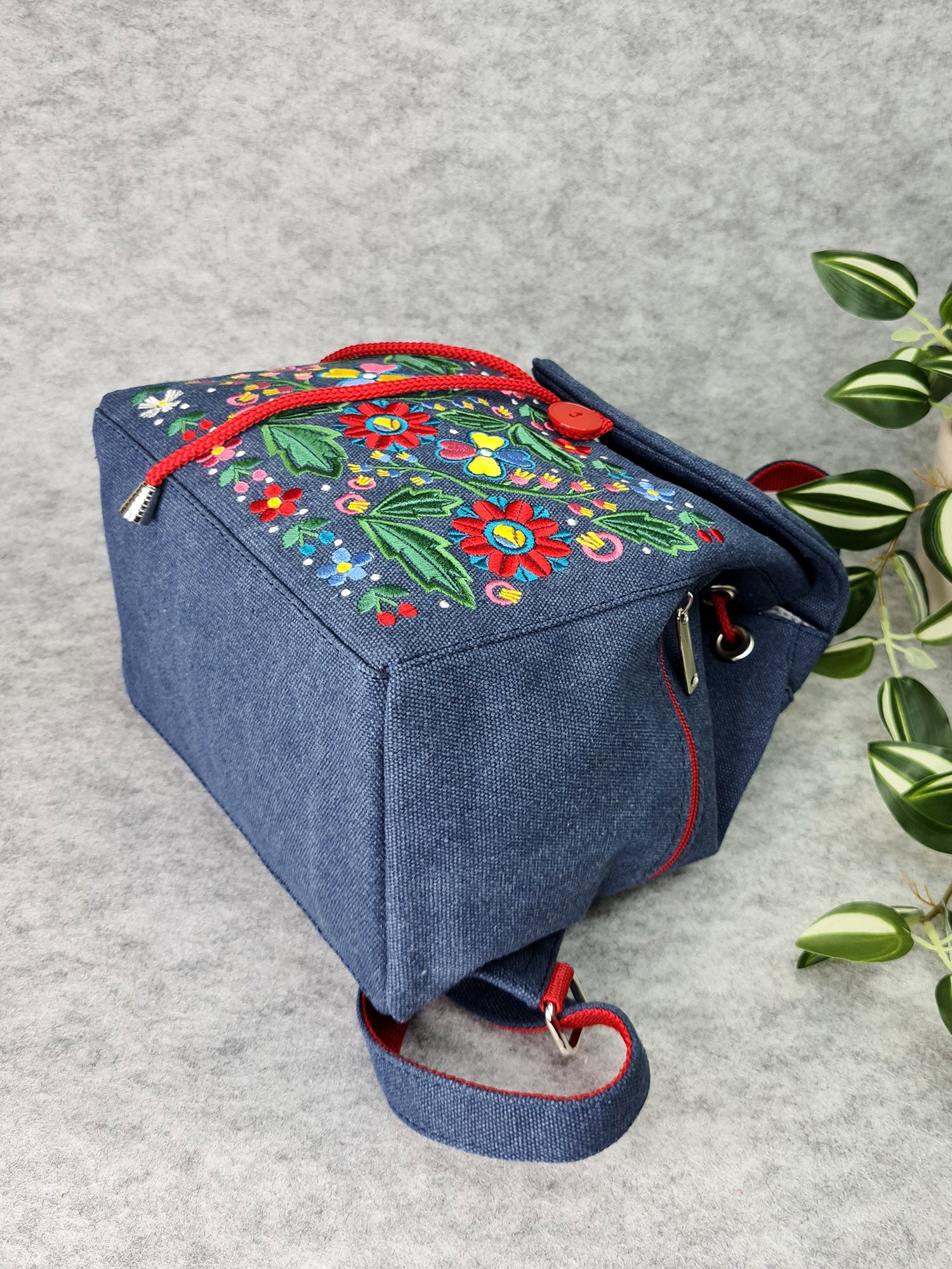 Backpack with "Unconquered" embroidery, blue
