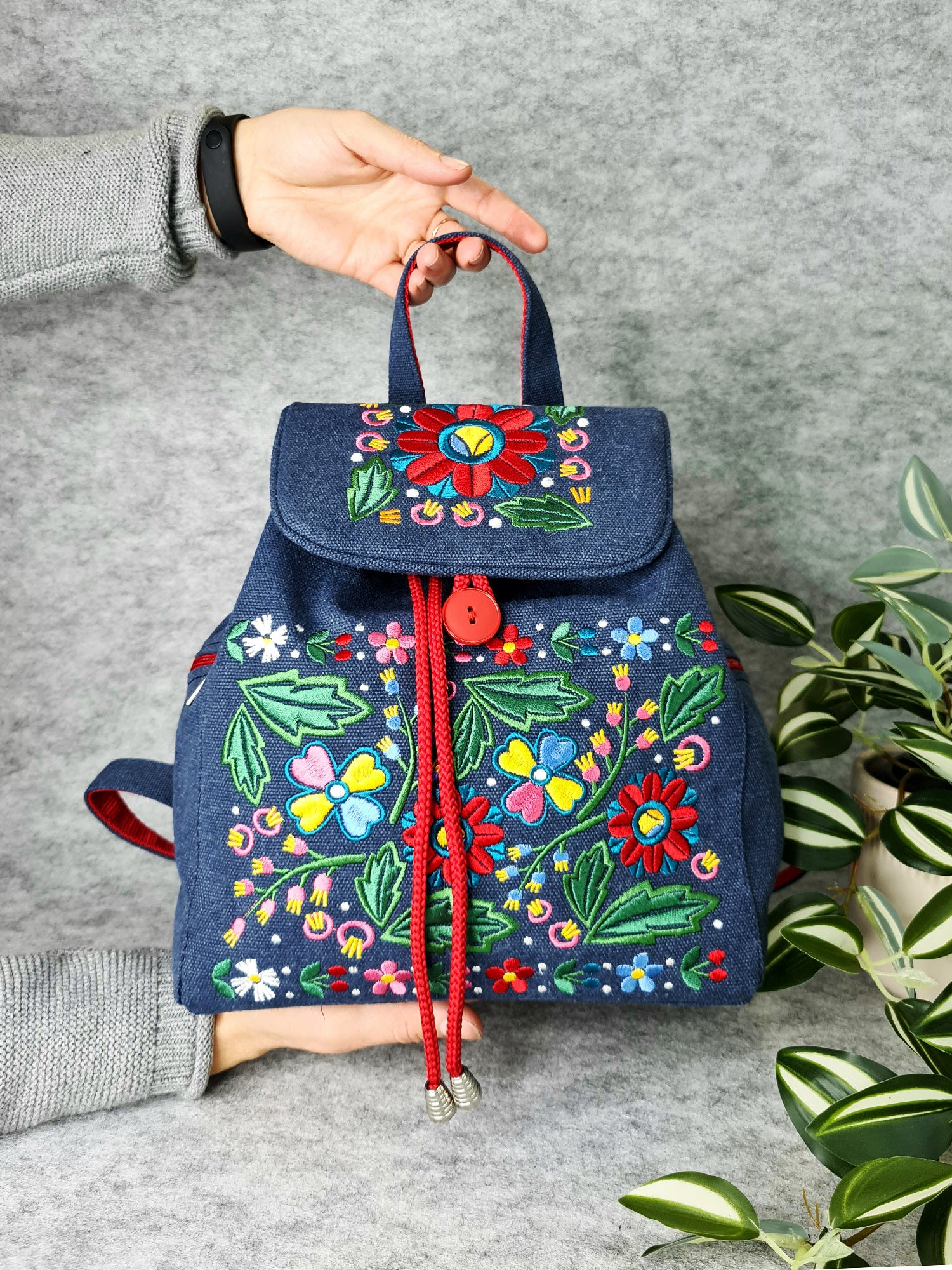Backpack with "Unconquered" embroidery, blue
