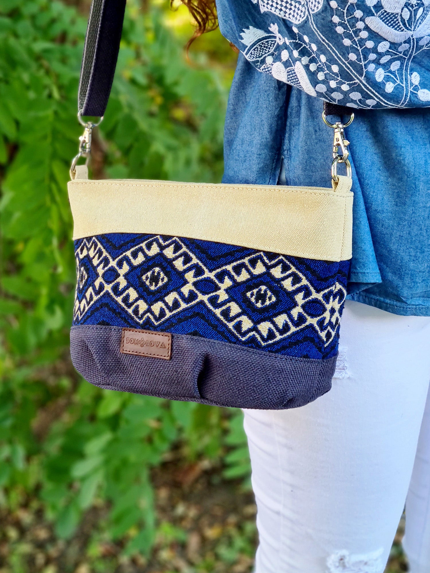 A small Ethno handbag with a blue ornament