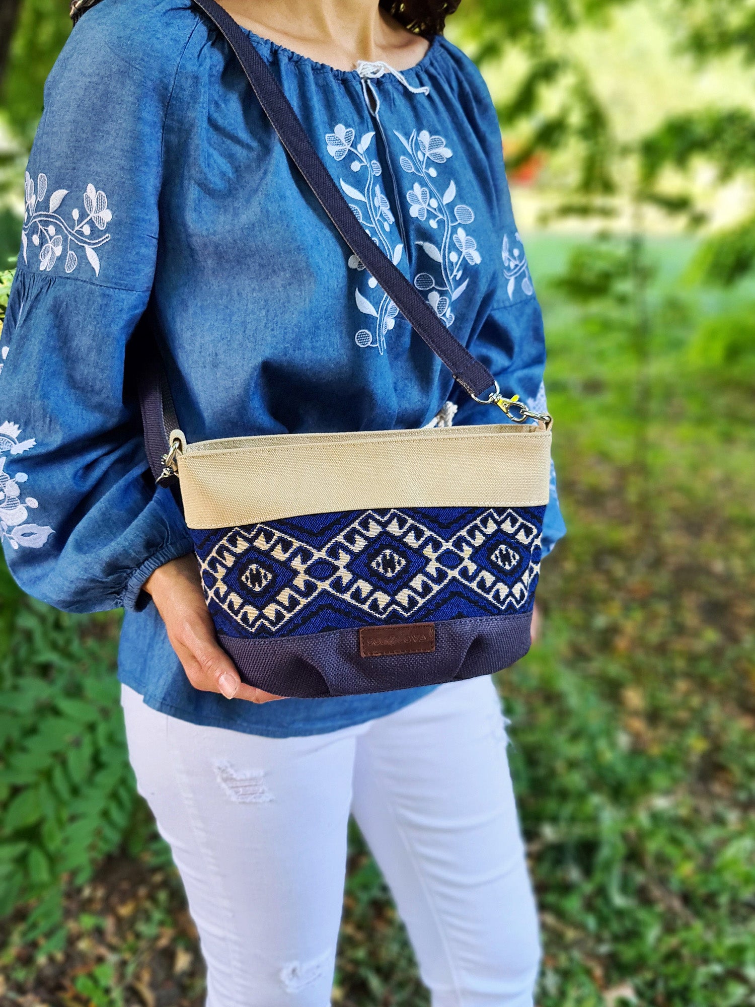 A small Ethno handbag with a blue ornament
