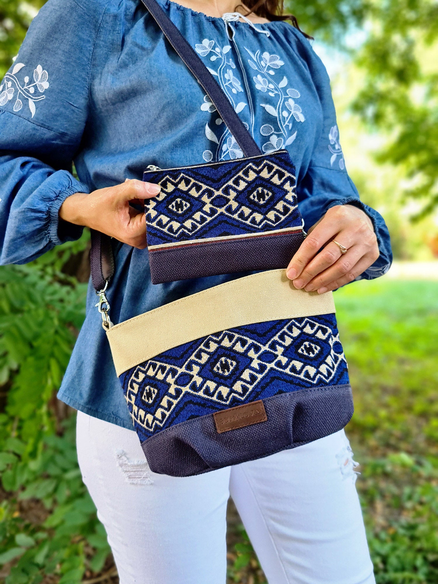 A small Ethno handbag with a blue ornament