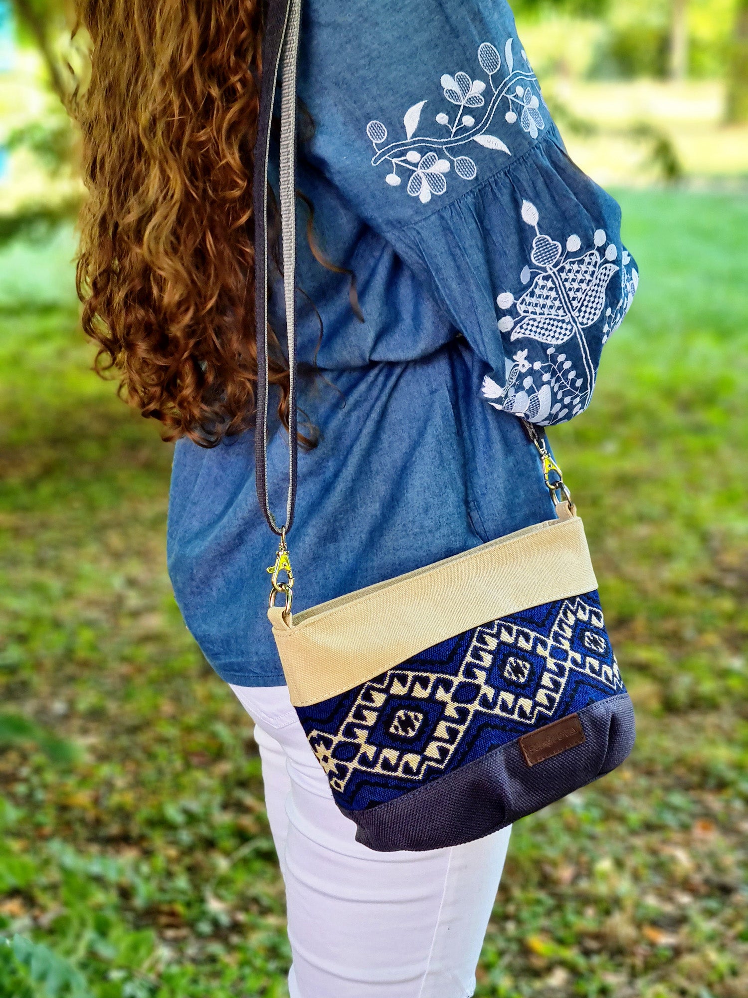 A small Ethno handbag with a blue ornament